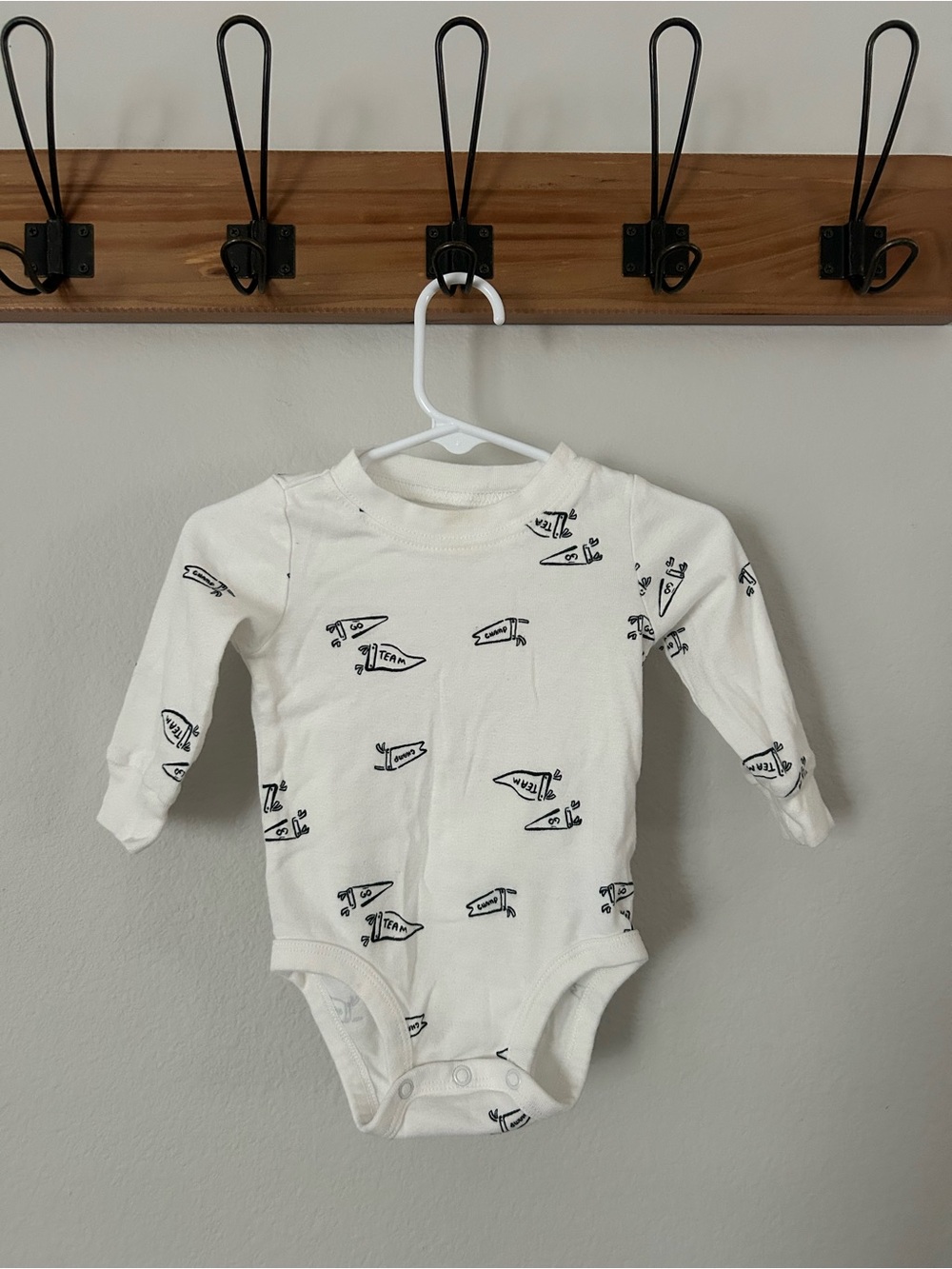 Carter's Cream Long-Sleeve Baby Bodysuit with Black Pennant Print